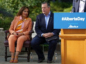 Alberta Lt.-Gov. Salma Lakhani, left, and Premier Jason Kenney gathered with Indigenous leaders in the Reconciliation Garden on the Alberta legislature grounds on Thursday, Sept. 1, 2022, to mark the first official Alberta Day.