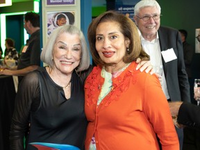 Photo of Del Dilkie and Alberta Lt.-Gov. Salma Lakhani at an Edmonton fundraiser last week that raised enough funds to buy a women's cooperative in Uganda a new generator for their guesthouse. Dilkie is 90-years-old and known in Edmonton as a voracious fundraiser. (Supplied Photo/Gord Deeks)
