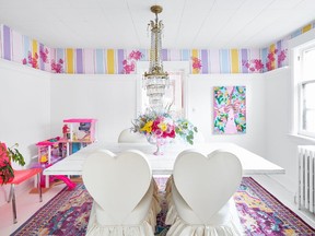 Designer and television host Tiffany Pratt painted her dining room with BeautiTone paint's curated collection of 13 Barbie-inspired paint colours in celebration of the 60th anniversary of the Barbie Dreamhouse.