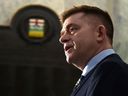 Brian Jean addresses the media after being sworn in as an MLA at the Alberta Legislature in Edmonton on April 7, 2022.