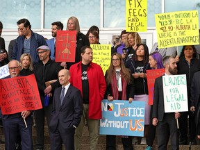 Criminal defence lawyers rallied outside the law courts in Edmonton on Friday, September 23, 2022, to demand the government to fix legal aid in Alberta.