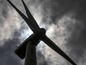 A wind turbine manufactured by Suzlon Energy Ltd. operates at the Ostro Energy Pvt. Dewas Wind Project in Dewas, Madhya Pradesh, India, on Monday, Aug. 14, 2017. As of June, India had 32 gigawatts of wind capacity. The nation is aiming to raise that to 60 gigawatts by 2022 as part of the country's climate pledge. Photographer: Dhiraj Singh/Bloomberg