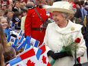 Queen Elizabeth II greets those who wish to walk about outside Edmonton City Hall on Wednesday, May 25, 2005. 