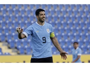 Uruguay's Luis Suarez reacts while playing against Iran on Sept. 23, 2002.