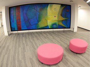 The Norman Yates mural restored in Milner Library by the Edmonton Arts Council — just one of the duties of the organization.