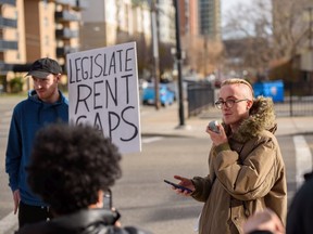 Fable Dowling, a spokesperson with ACORN, speaks during a rally organized by ACORN Tenant Union for rent control outside the Boardwalk head office on Saturday, October 29, 2022.