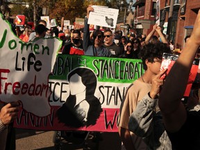 Members of the Iranian community in Edmonton rally on Saturday in support of people inside Iran who are protesting for their rights in opposition to Iran?s clerical authorities. Supplied, Asal Andarzipour