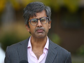 Sameer Kayande, NDP candidate for the Calgary Ilbo Party, speaks to the media during a news conference in southwest Calgary on Wednesday, October 5, 2022.