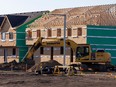 Crews are seen working at the Blatchford development on Oct. 6, 2022 in Edmonton.