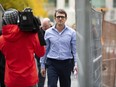 Cameron Ortis, a senior intelligence official at the RCMP, walks after leaving the courthouse in Ottawa after being granted bail, Tuesday, Oct. 22, 2019.