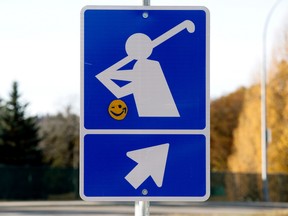 A flashing smiley face has been added to direct traffic to the Royal Mayfair Golf Club in Edmonton on Wednesday, October 26, 2022.