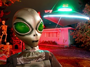 An alien alien has landed in the front yard of this home at 50 Street and 106A Avenue in Edmonton's Gold Bar neighborhood, just in time to celebrate Halloween on Monday, October 31, 2022.