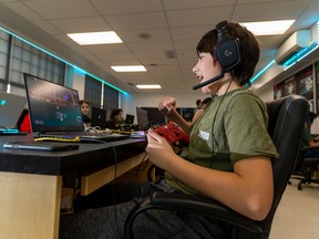Twelve-year-old Grade 7 student Sebastian Compri takes part in esports at Vimy Ridge Academy in its inaugural year on Wednesday, Oct. 26, 2022.