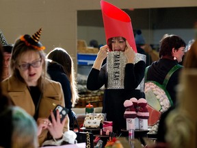 Dressed as a Mary Kay lipstick Wanda Groenewegen takes part in the Halloween themed Hazeldean Community Artisan Market, 9630 66 Ave., in Edmonton, Saturday, Oct. 29, 2022.