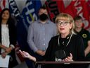 United Nurses of Alberta (UNA) president Heather Smith takes part in a press conference where Alberta's health-care unions advocated the government take steps to fully address the staffing crisis in health care, Monday Oct. 24, 2022. 