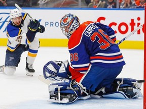 St. Louis Blues forward Jordan Kyrou (25) rings a shot of the goal post on Edmonton Oilers goaltender Jack Campbell (36) during the second period at Rogers Place.
