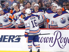 Oct 1, 2022; Winnipeg, Manitoba, CAN; Edmonton Oilers left wing Tyler Benson (16) celebrates after scoring a goal against the Winnipeg Jets during the first period at Canada Life Centre. Mandatory Credit: James Carey Lauder-USA TODAY Sports