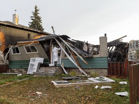 What appears to be an explosion destroyed a home at 128 Avenue and 67 Street and a duplex next door on Friday, Oct. 14, 2022, in Edmonton.