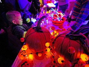 5-year-old Oakland Davis gets enchanted at Pumpkin After Dark on Friday, September 30, 2022.  A display of more than 6000 hand-carved pumpkins is held in Edmonton's Borden Park from September 29 to October 31, 2022.
