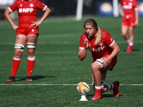 Team Canada's Sophie de Goede lines up for a penalty kick against Team Italy during second half test match rugby action at Starlight Stadium in Langford, B.C., on Sunday, July 24, 2022.THE CANADIAN PRESS/Chad Hipolito