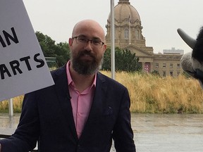 Progress Alberta executive director Duncan Kinney at a climate change demonstration outside the Federal Building in Edmonton on Aug. 1, 2017.