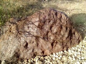 A photo of the El Ali meteorite found in Somalia. After rumors of the discovery spread, the country's government kept the rock and later released it to the miners who discovered it.