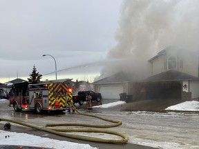 Strathcona County firefighters battle a blaze in Sherwood Park on Friday, Nov. 25, 2022, that left a house destroyed. Supplied.