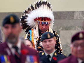 Chief Vernon Saddleback (Samson Cree Nation) honors and honors Indigenous veterans who served in the Canadian Armed Forces at a memorial service held at the Alberta Legislature in Edmonton on Tuesday, November 8, 2022 .