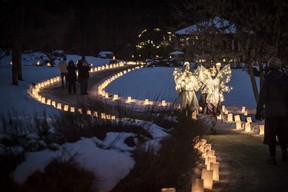 An illuminated walkway illuminates the night sky of Luminaria. PROVIDED