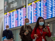 Federal government 'recommends' people wear masks when traveling