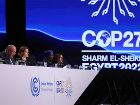 Egypt's Foreign Minister Sameh Shukri (L), heads the closing session of the COP27 climate conference, at the Sharm el-Sheikh International Convention Centre in Egypt's Red Sea resort city of the same name, on November 20, 2022. (Photo by JOSEPH EID / AFP)