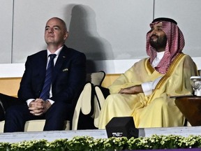 FIFA President Gianni Infantino and Saudi Arabia's Crown Prince Mohammed bin Salman al-Saud during the opening ceremony of the Qatar 2022 World Cup match between Qatar and Ecuador Nov. 20.