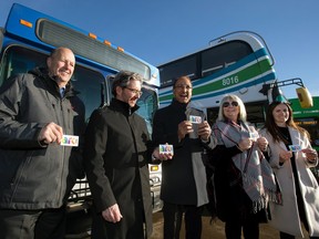 (left to right) Leduc Mayor Bob Young, Strathcona County Mayor Rod Frank, Edmonton Mayor Amarjeet Sohi, St. Albert Mayor Cathy Heron and Spruce Grove City Councillor Danielle Carter pose for a photo with the new transit Arc card, Edmonton region's electronic fare payment system, during a media event at the West Clareview Transit Centre, Monday Nov. 21, 2022.