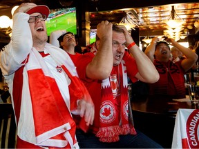 Soccer fans watch the first half of the Canada and Belgium World Cup match at The Pint, 8032 104 St., in Edmonton on Wednesday, Nov. 23, 2022.