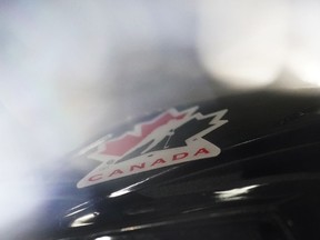 A Hockey Canada logo is shown on a player during the warm-up prior to Rivalry Series hockey action against the United States in Kamloops, B.C., Thursday, Nov. 17, 2022.&ampnbsp;Hockey Canada's independent nomination committee will select eight directors and a new board chair from more than 550 applicants instead of putting candidates up for a wider vote, according to a letter sent to provincial and territorial members.