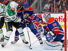 Edmonton Oilers goaltender Jack Campbell (36) makes a save on Dallas Stars forward Tyler Sequin (91) during the second period at Rogers Place on Saturday, Nov. 5, 2022.