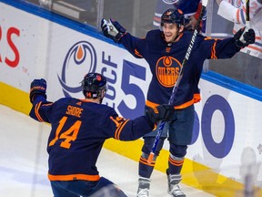 Edmonton Oilers Derek Ryan (10) celebrates his goal on Nashville Predators goalie Juuse Saros (74) with teammate Devin Shore (14) during first period NHL action on Tuesday, Nov. 1, 2022 in Edmonton.