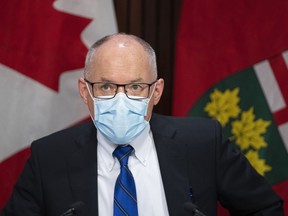 Chief medical officer of health Dr. Kieran Moore holds a news conference in Toronto on Wednesday, March 9, 2022. Moore has said he would recommend masking in certain indoor settings if hospitals began cancelling surgeries.