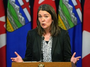 UCP Leader Danielle Smith speaks to reporters in Edmonton after being sworn in as premier on Oct. 11, 2022.