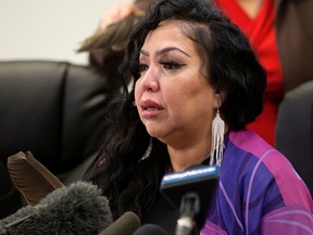 Tears stream down the face of Pearl Gambler, Bigstone Cree First Nation member, as she speaks to the media on Thursday Nov. 3, 2022, about the mistreatment she received at Edmonton's Misericordia Community Hospital when delivering her daughter, Sakihitowin Azaya Gambler, who died shortly after birth.