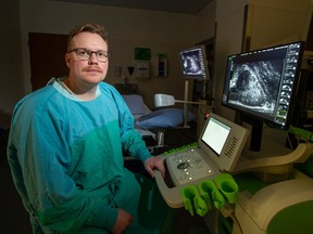 Dr. Adam Kinnaird on Friday, Nov. 25, 2022, with a high resolution micro-ultrasound that shows a prostate with an area of suspicion. He is a renowned surgeon-scientist and holder of the Frank and Carla Sojonky Chair in Prostate Cancer Research.