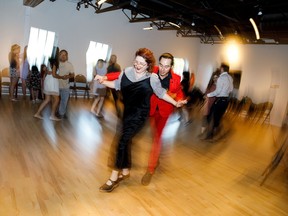 Katryna Drouin, left, and Edwin Torres partake in an event by Sugar Swing Ballroom, which will be hosting Swing Alive for New Year’s Eve.