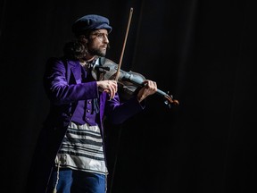 Ali Arian Molaei (The Fiddler) in Broadway Across Canada's North American tour of Fiddler on the Roof.