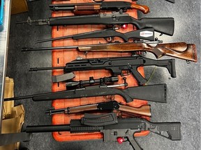 Police found guns, drugs, cash and coins during a raid at a residence in Edmonton Nov. 17, 2022. Photo supplied by Edmonton Police Service
