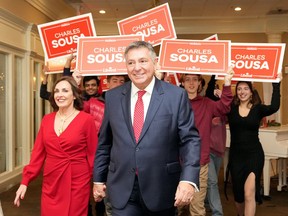 Liberal candidate Charles Sousa reacts as results come in at the by-election night headquarters for the riding of Mississauga-Lakeshore in Mississauga, Ont., Monday, Dec. 13, 2022. THE CANADIAN PRESS/Nathan Denette