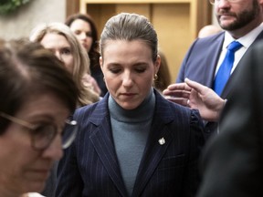 Conservative MP Raquel Dancho heads back to the opposition lobby with caucus colleagues after she was ordered to leave the chamber by the Speaker of the House of Commons during question period, Thursday, Dec. 8, 2022.