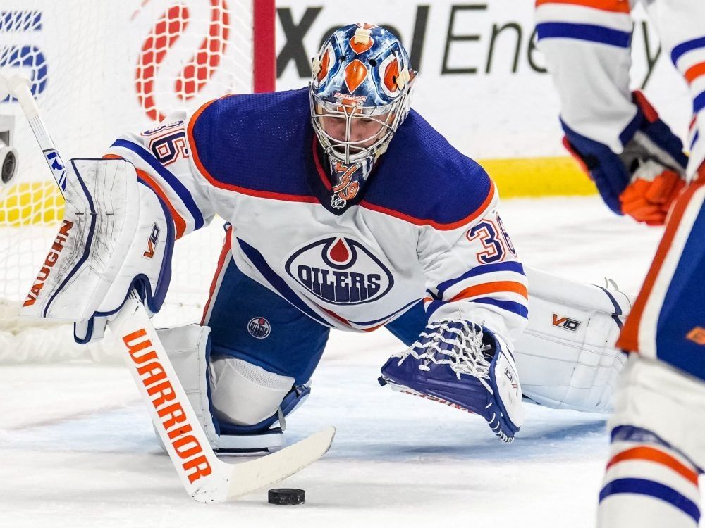 Edmonton Oilers' Warren Foegele (37) and Klim Kostin (21) celebrate a goal  against the Toronto Maple Leafs during the second period of an NHL hockey  game, Wednesday, March 1, 2023 in Edmonton