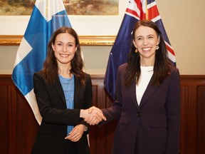 Finlands Prime Minister Sanna Marin, left, shakes hands with New Zealand's Prime Minister Jacinda Ardern during a bilateral meeting in Auckland, New Zealand, on November 30, 2022.