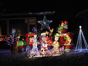 Christmas decorations outside a home on Edmonton's Candy Cane Lane, Monday, Dec. 12, 2022. Candy Cane Lane is on 148 Street between 99 Avenue and 92 Avenue.