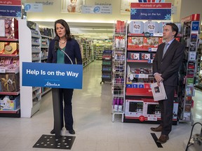 Premier Danielle Smith and Health Minister Jason Copping make an announcement about the availability of children’s medication on Tuesday, Dec. 6, 2022, in Edmonton.